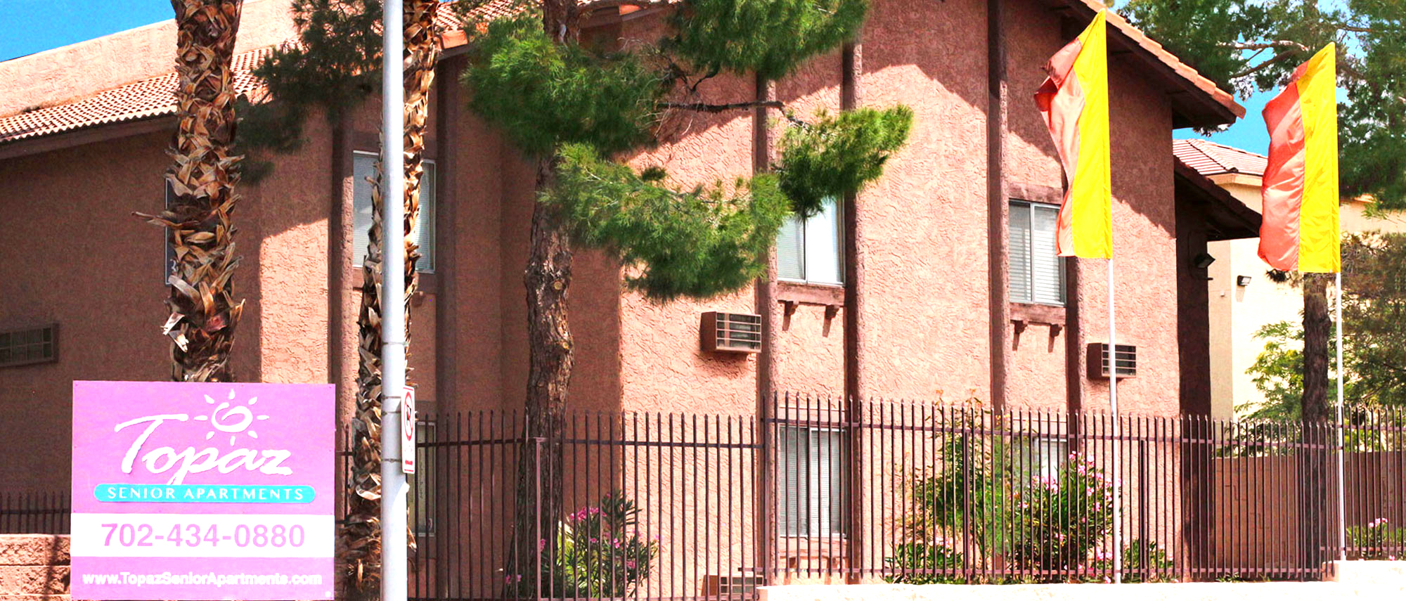 This image shows the exterior of Topaz Senior Apartments